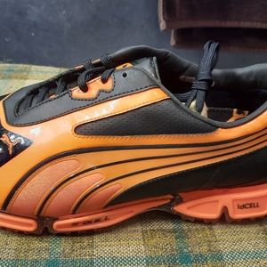 Puma amp cell golf shoes. Men's size 10.5, brand new never worn. Black/orange